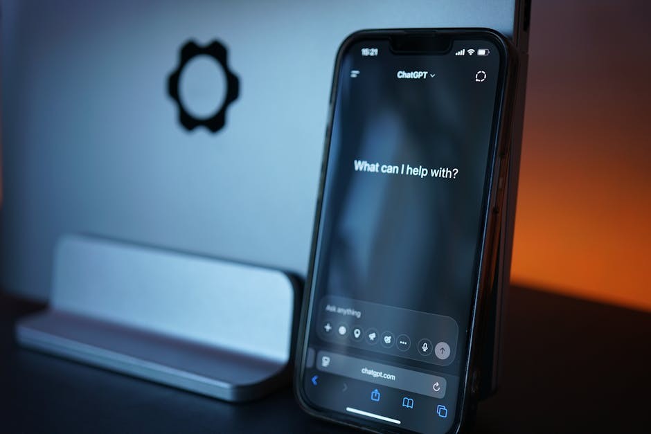 Gros plan d'un smartphone avec interface de chat IA, présentant une technologie de pointe dans un design élégant.